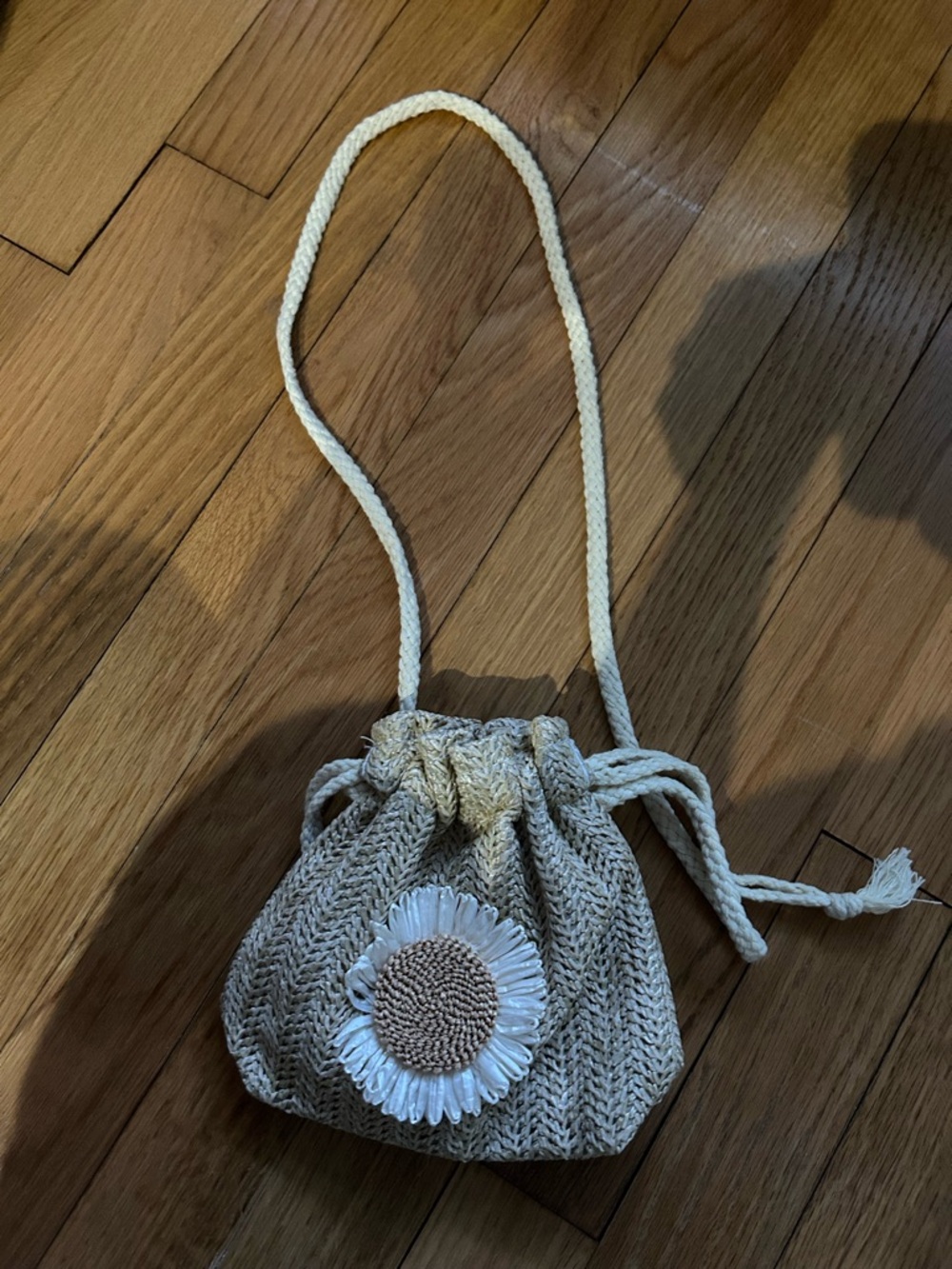 Woven Cream Drawstring Crossbody Bag with Daisy Accent